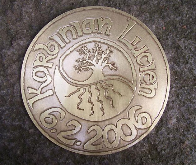 Geburtsscheibe aus Messing