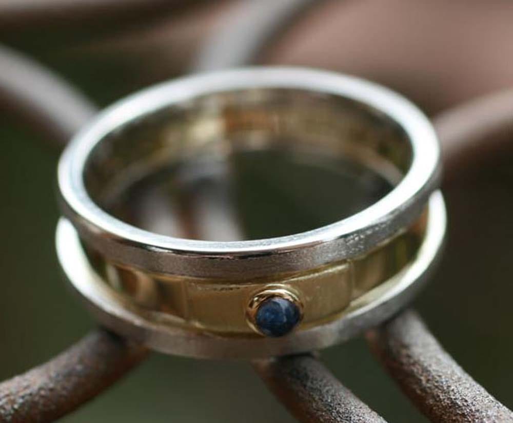 Plantinring mit Saphir