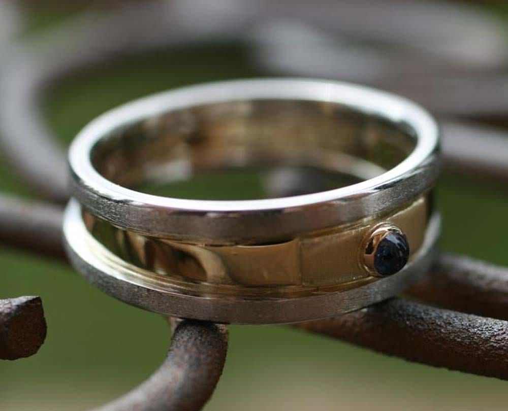 Plantinring mit Saphir