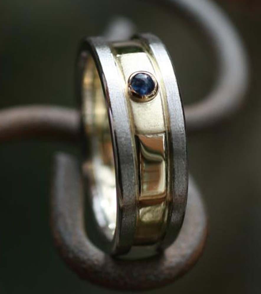 Plantinring mit Saphir