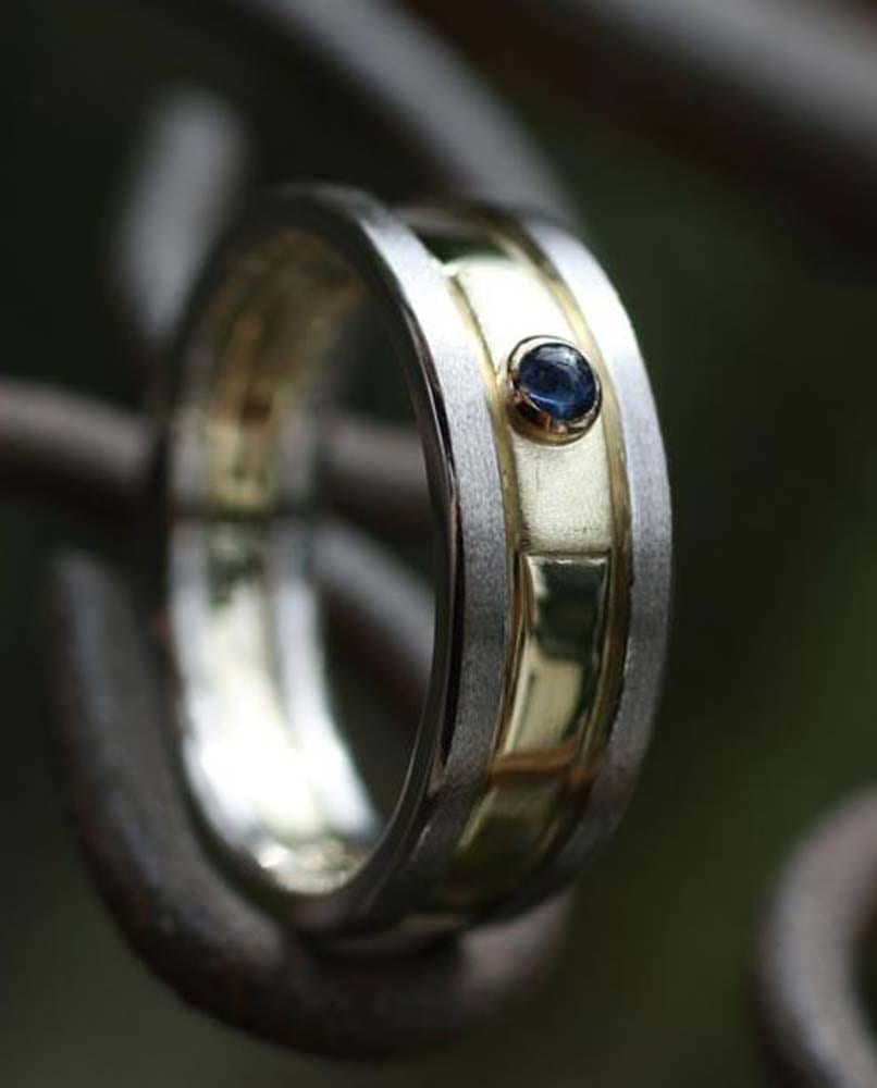 Plantinring mit Saphir