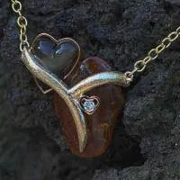 Bernsteinanhänger zwei Herzen in Rotgold, Weißgold und Gelbgold